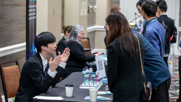 Professional talking to students about employment. Professional talking to students about employment.